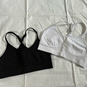 DSG racerback sports bras, size small, color white and black
